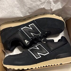 New Balance kids Black and Tan Sneakers